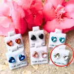 Hypoallergenic silicone heart stud earrings with white zirconia stones