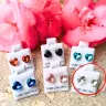   Hypoallergenic silicone heart stud earrings with white zirconia stones