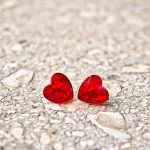 Hypoallergenic Silicone heart earrings with red zirconia stone