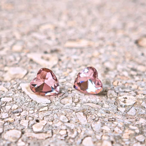 Hypoallergenic silicone heart earrings with pink zirconia stone