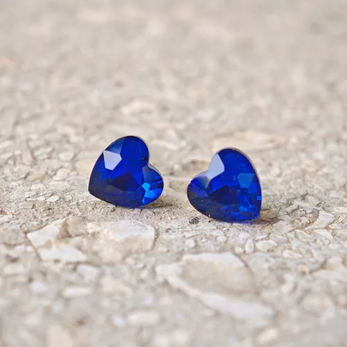 Hypoallergenic Silicone heart stud earrings with dark blue zirconia stones