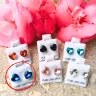   Hypoallergenic Silicone heart stud earrings with dark blue zirconia stones