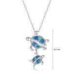 Silver turtle pendant in blue with mother and child