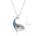 Silver whale pendant with blue zirconia