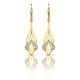 Long drop / dangle gold earrings with an open tulip